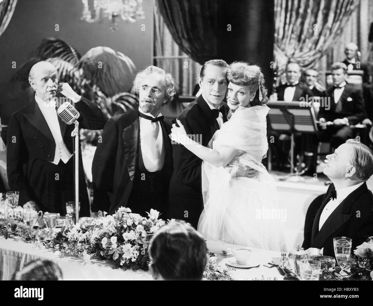 HER HUSBAND'S AFFAIRS, Mikhail Rasumny (second from left), embracing