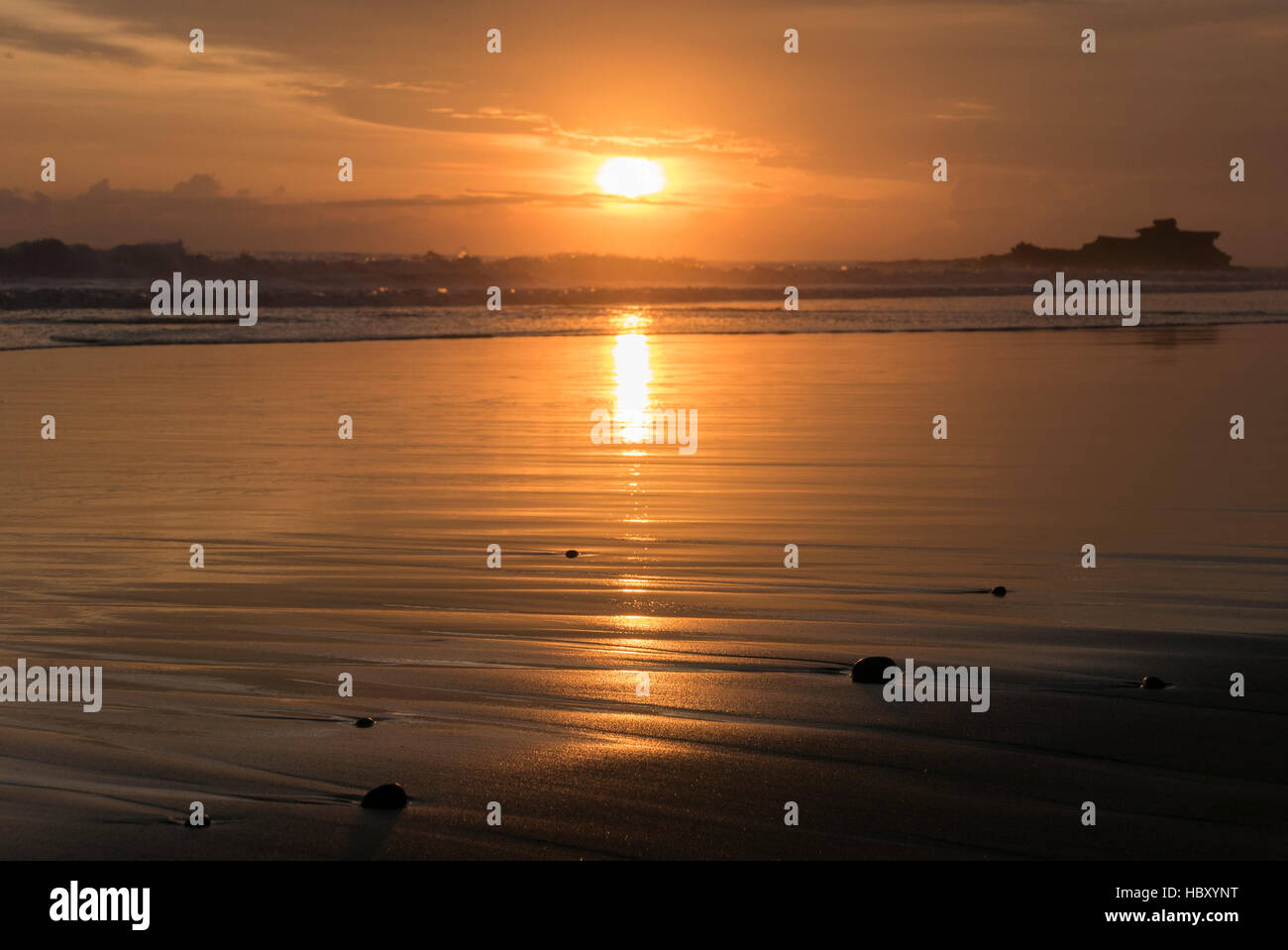 Colored sunset at Balian beach. Bali, Indonesia Stock Photo