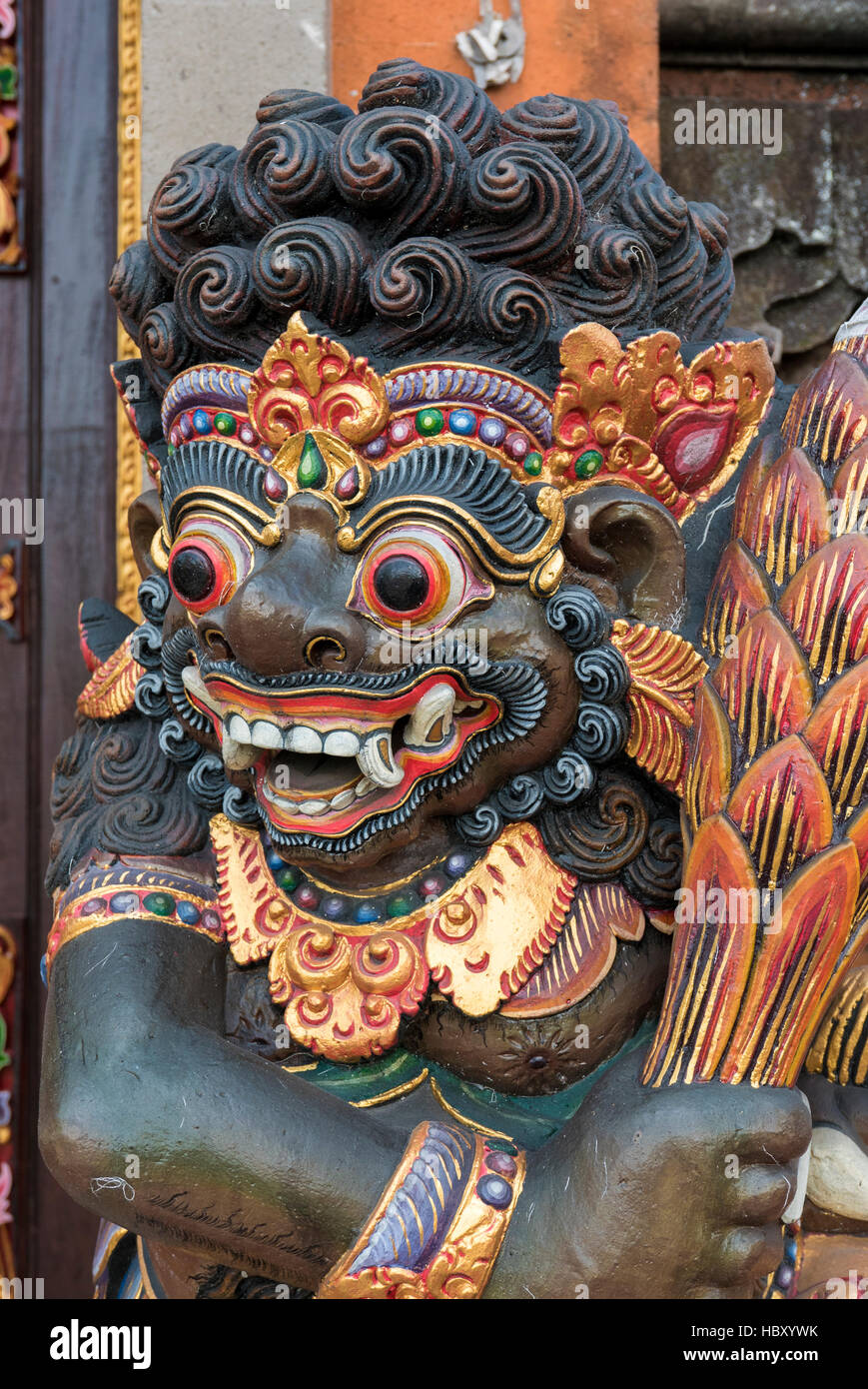 Dragon wooden sculpture on temple door in Bali, Indonesia Stock Photo