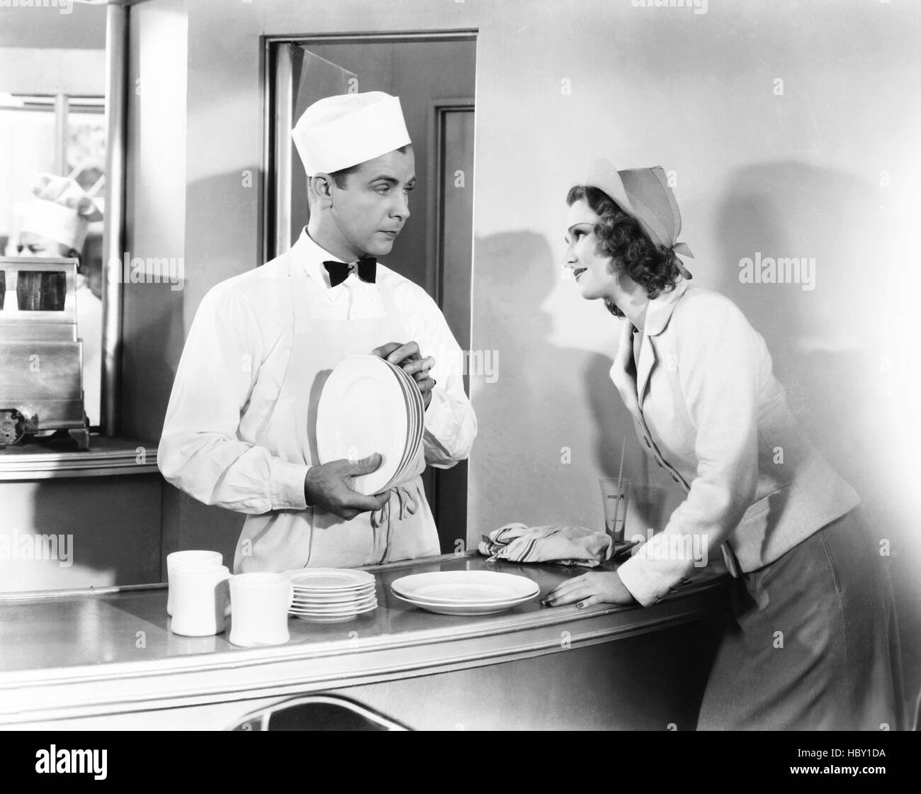 HOLLYWOOD HOTEL, from left Dick Powell, Rosemary Lane, 1937 Stock