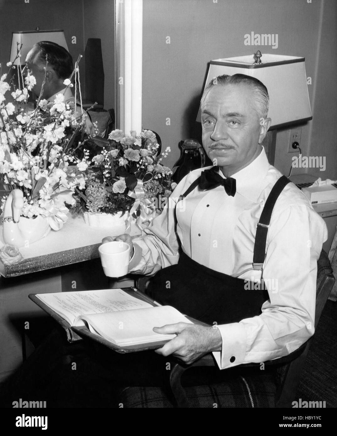 HOW TO MARRY A MILLIONAIRE, William Powell in dressing room, on-set ...