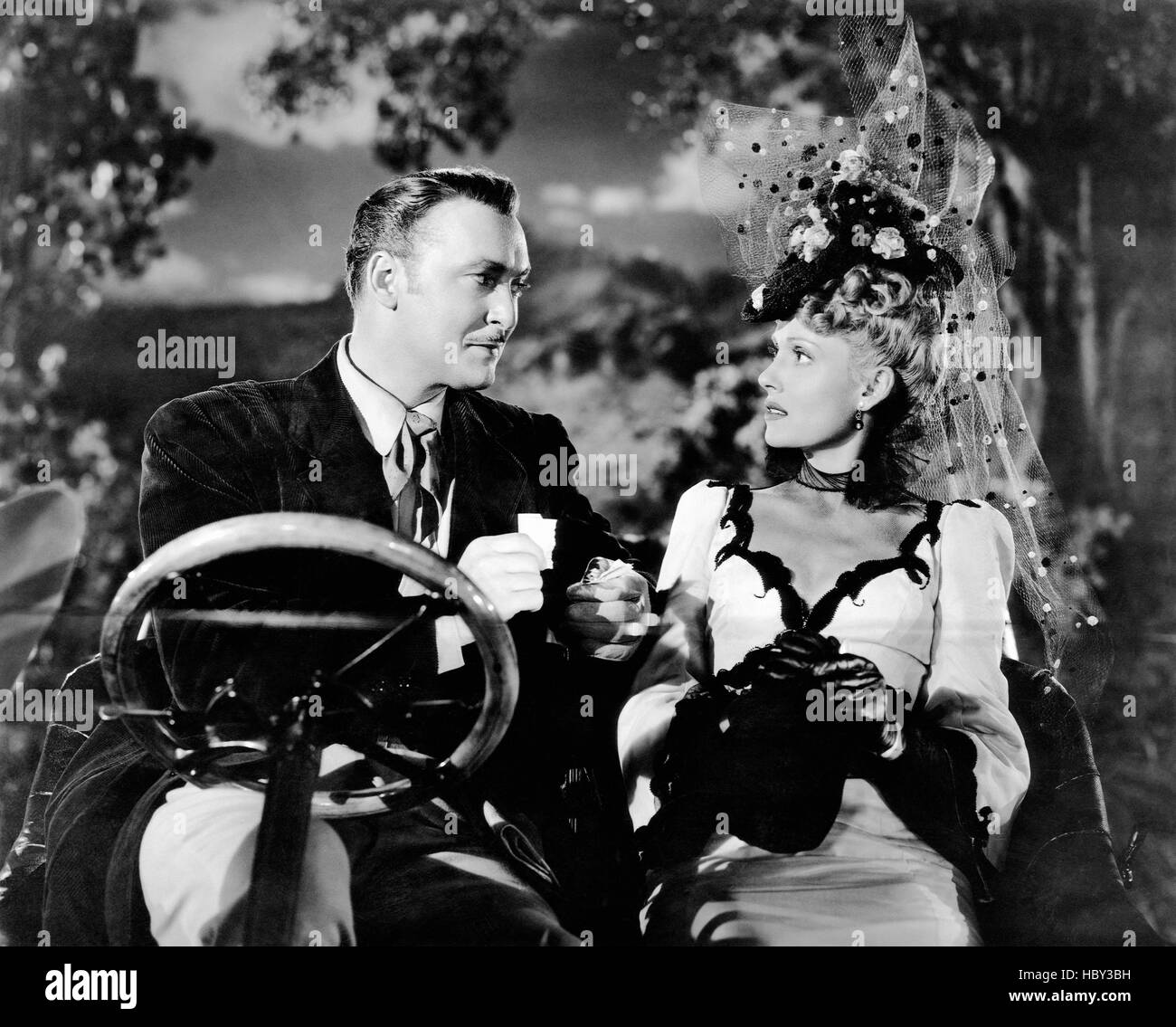 IN OLD OKLAHOMA, (aka WAR OF THE WILDCATS), from left, Albert Dekker, Martha Scott, 1943 Stock