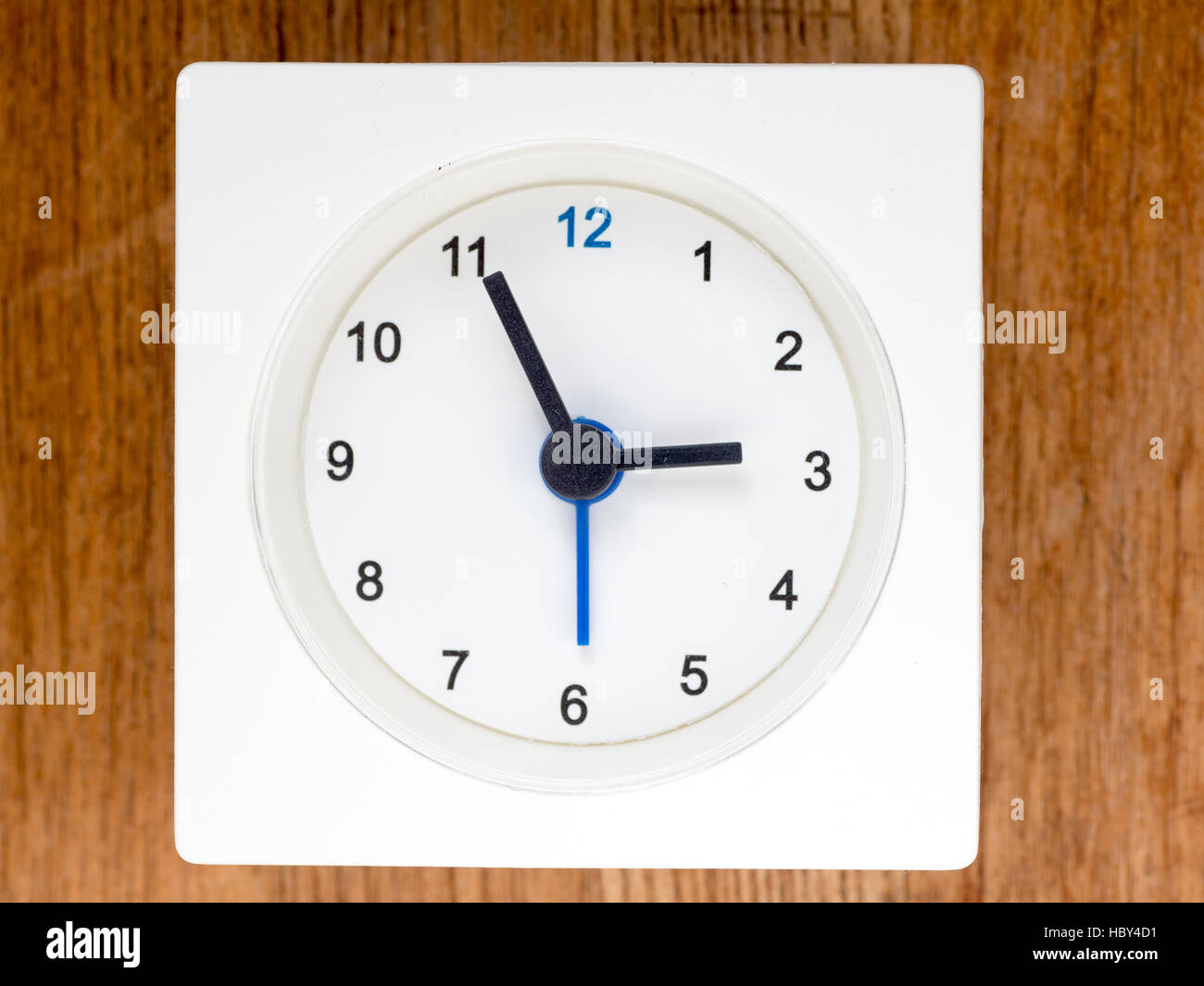 The second series of the sequence of time on the simple white analog clock , 24/96 Stock Photo