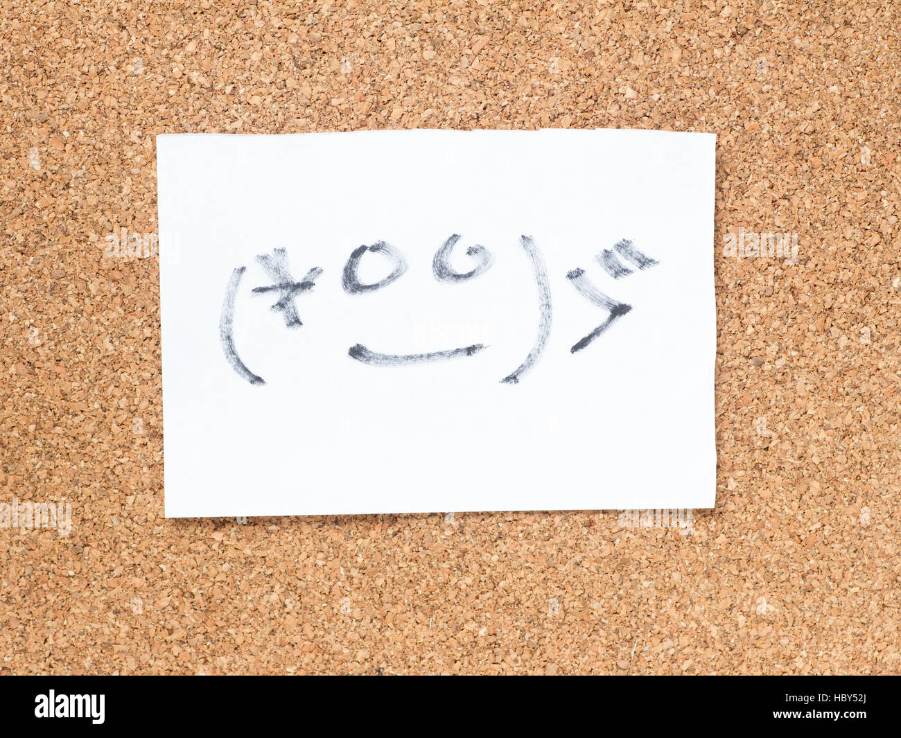 The series of Japanese emoticons called Kaomoji on the cork board, embarrassed Stock Photo Alamy