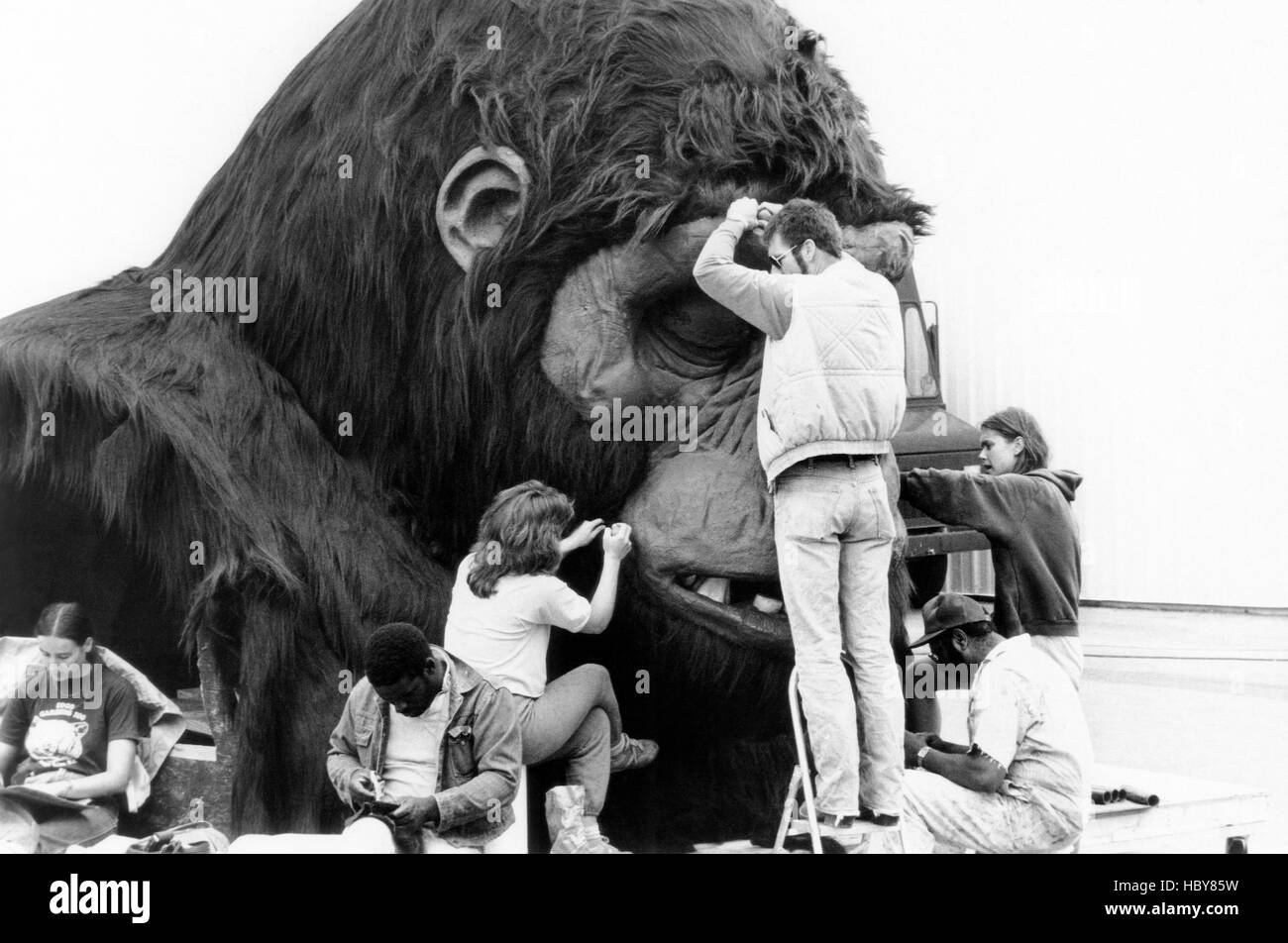 KING KONG LIVES, team of makeup artists touch up King Kong, on set