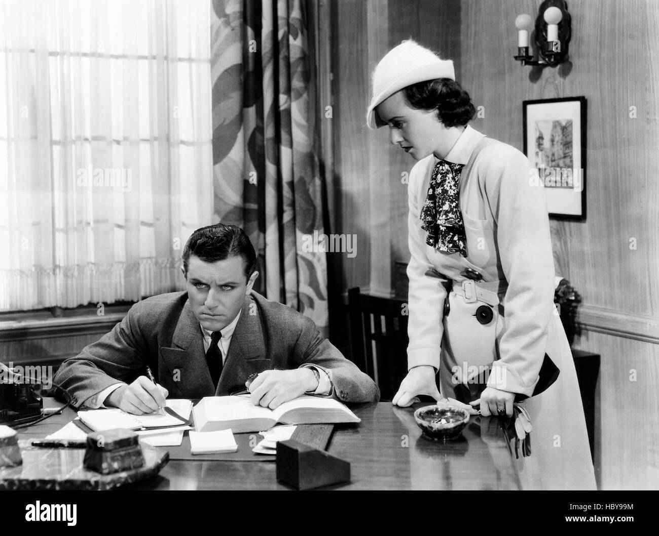 THE LAW IN HER HANDS, from left, Warren Hull, Margaret Lindsay, 1936 ...