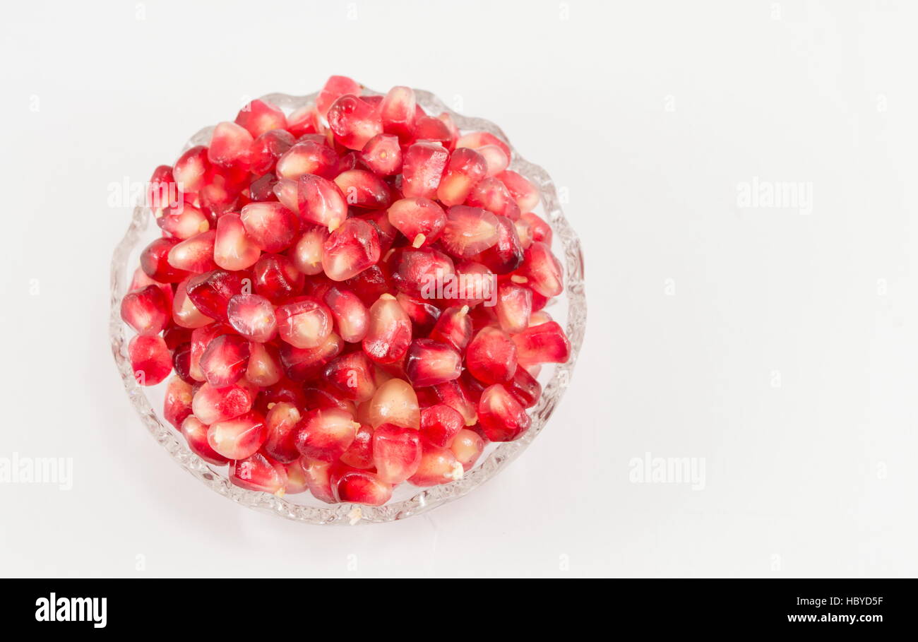 ripe fresh pomegranate on white background Stock Photo