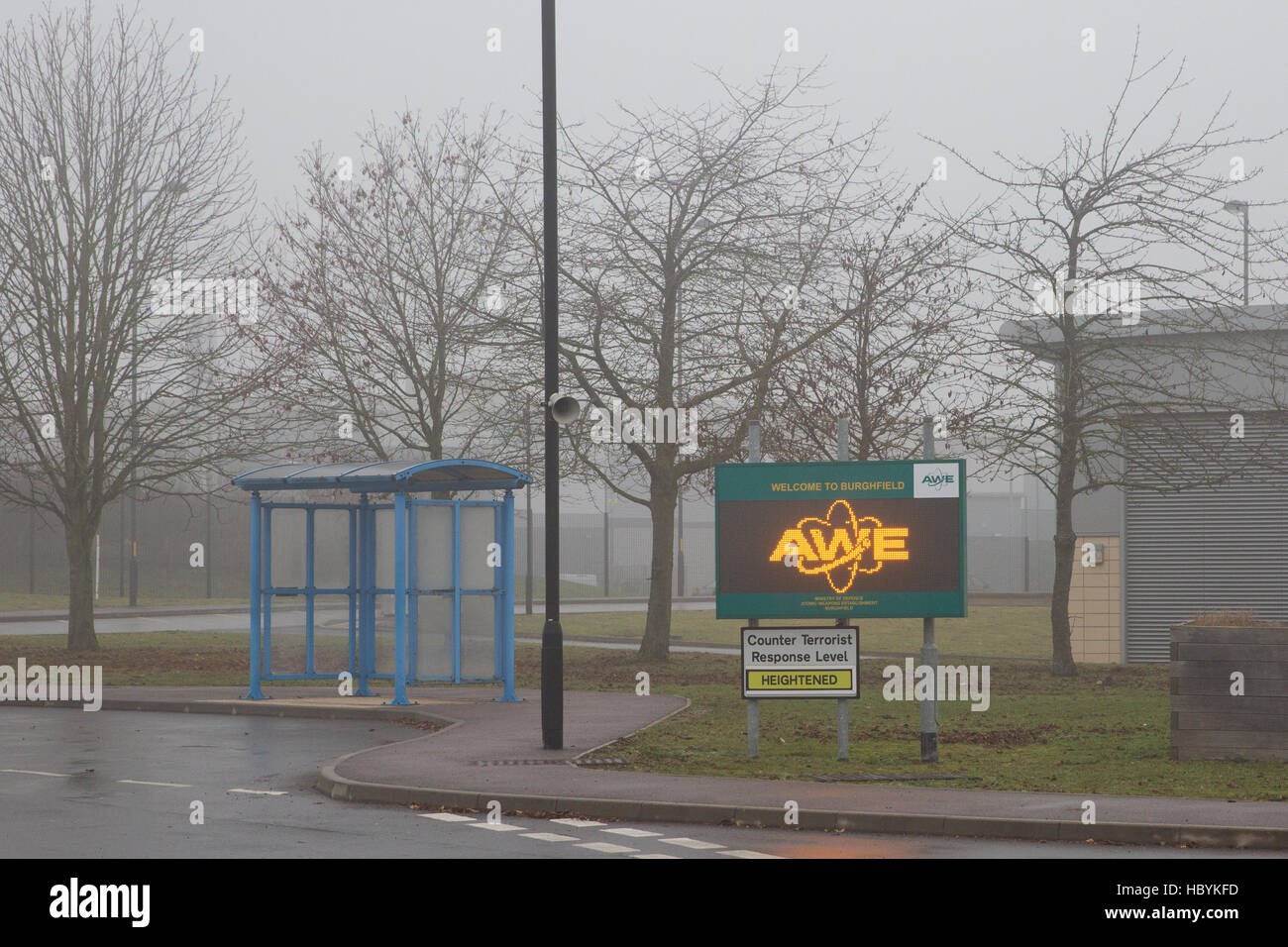 Burghfield, UK. 6th December, 2016. A sign inside the gate of AWE Burghfield on a foggy day of industrial action over pensions by members of the Unite Stock Photo
