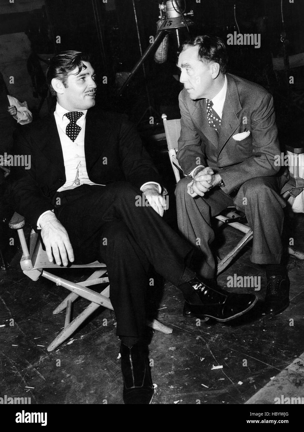 HONKY TONK, from left Clark Gable, director Jack Conway, on set, 1941