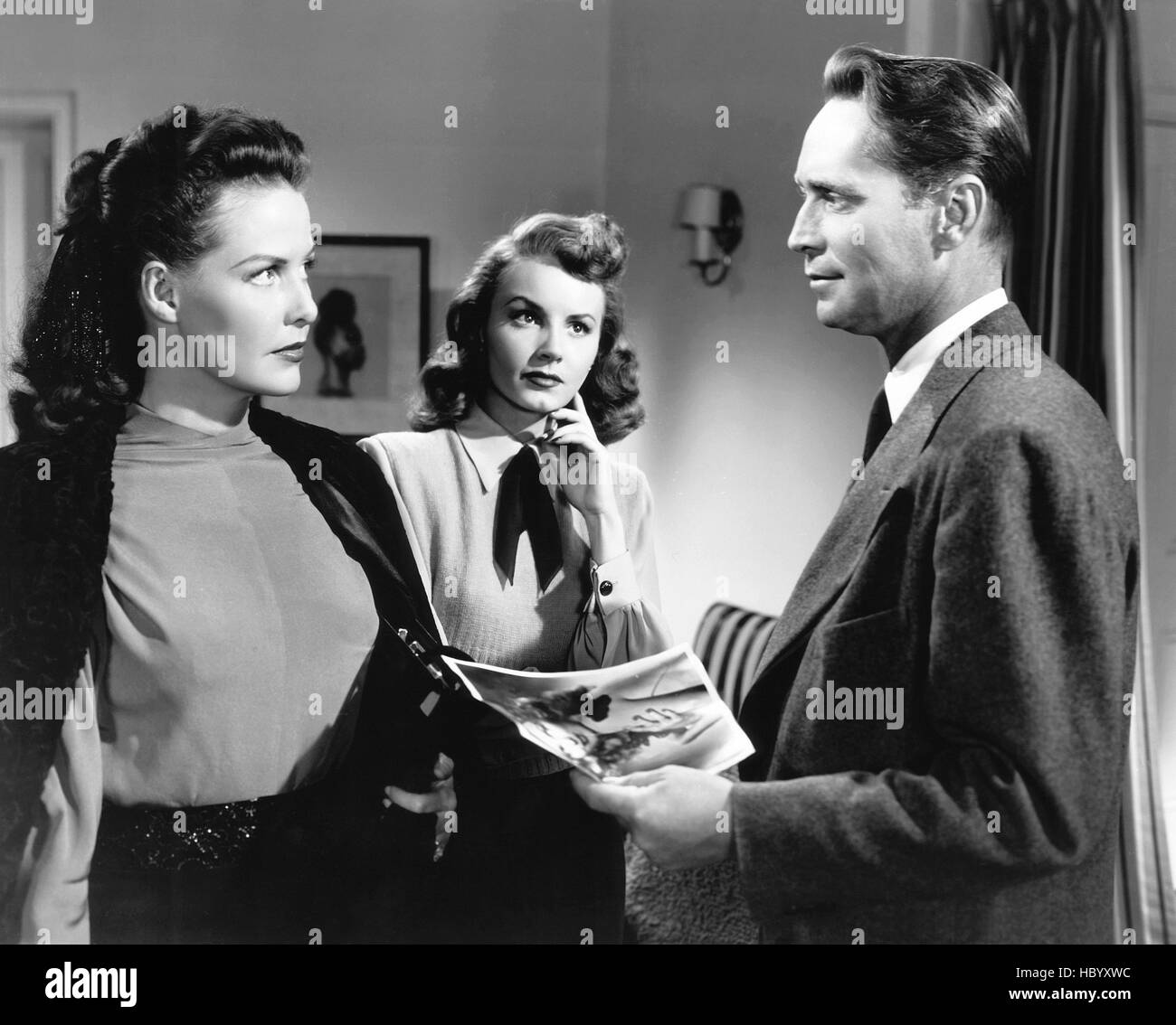 I LOVE TROUBLE, from left: Janis Carter, Janet Blair, Franchot Tone ...