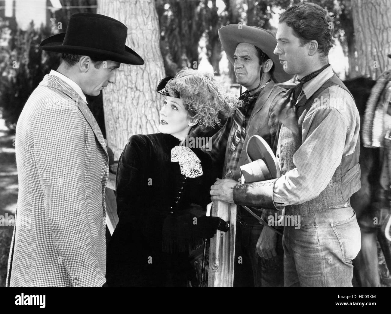 KNIGHTS OF THE RANGE, first, second and fourth from left: Victor Jory, Jean Parker, Russell Hayden, 1940 Stock Photo