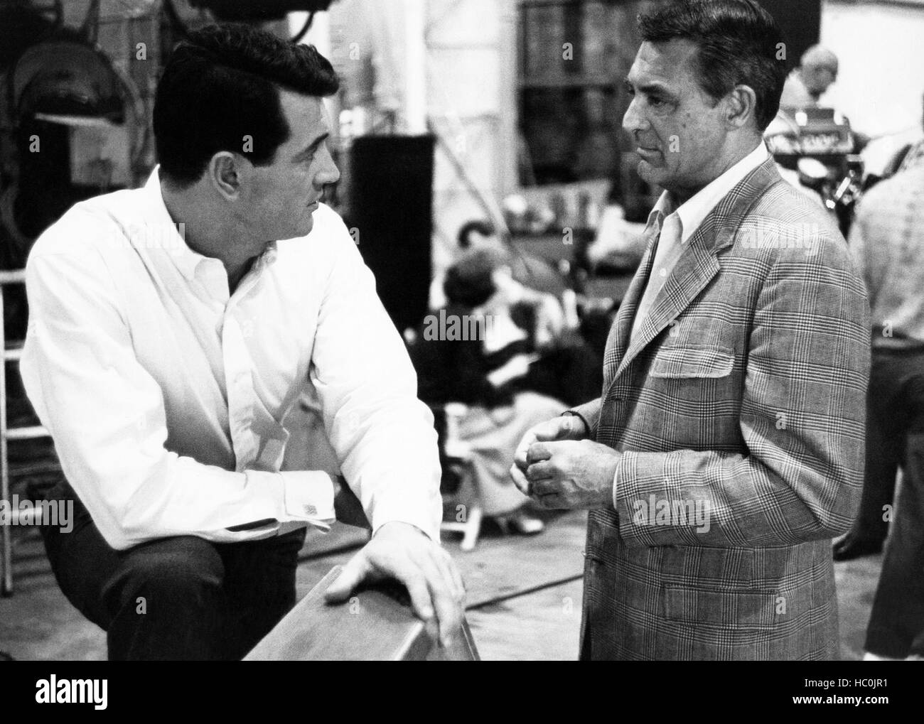 LOVER COME BACK, from left: Rock Hudson, being visited by Cary 