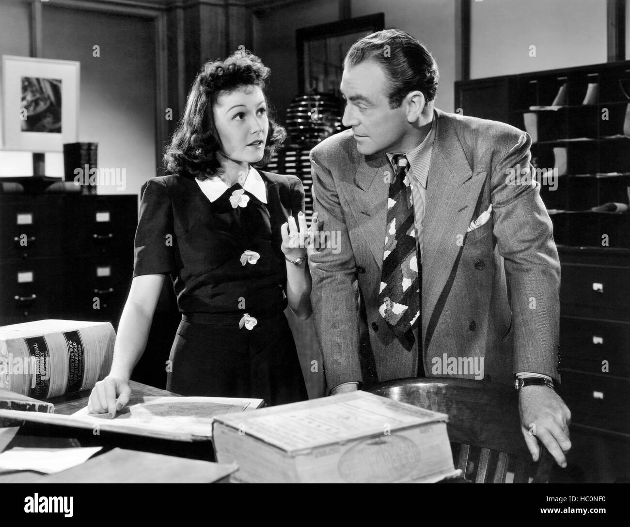 MAN AT LARGE, from left Marjorie Weaver, Richard Lane, 1941. ©20th