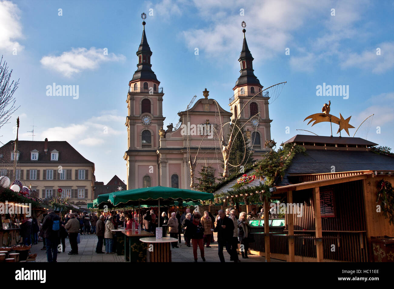 Christmas craft market at Ludwigsberg, Germany, shoppers at craftsmen's  booths under baroque themed decor that lights at night Stock Photo - Alamy