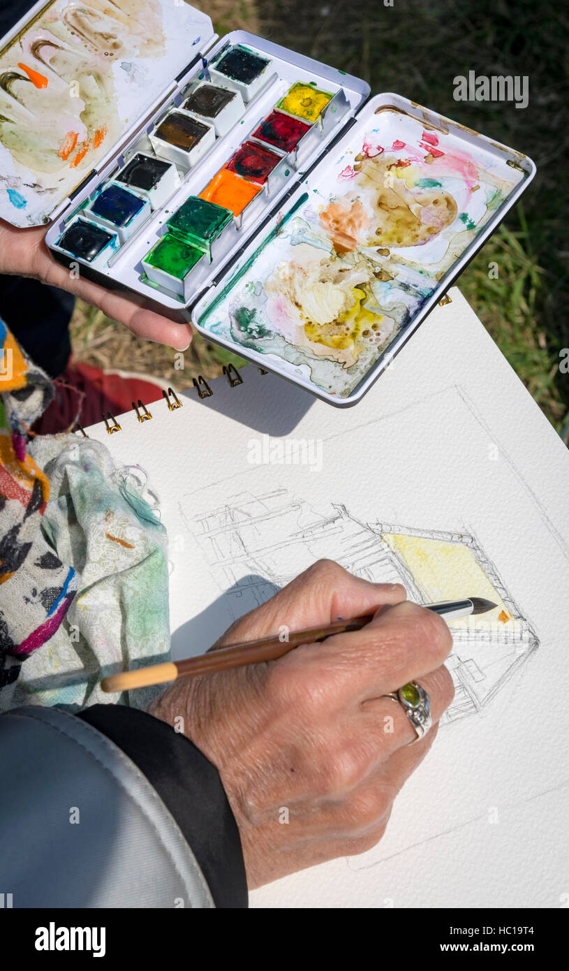 A watercolorist at work. Stock Photo