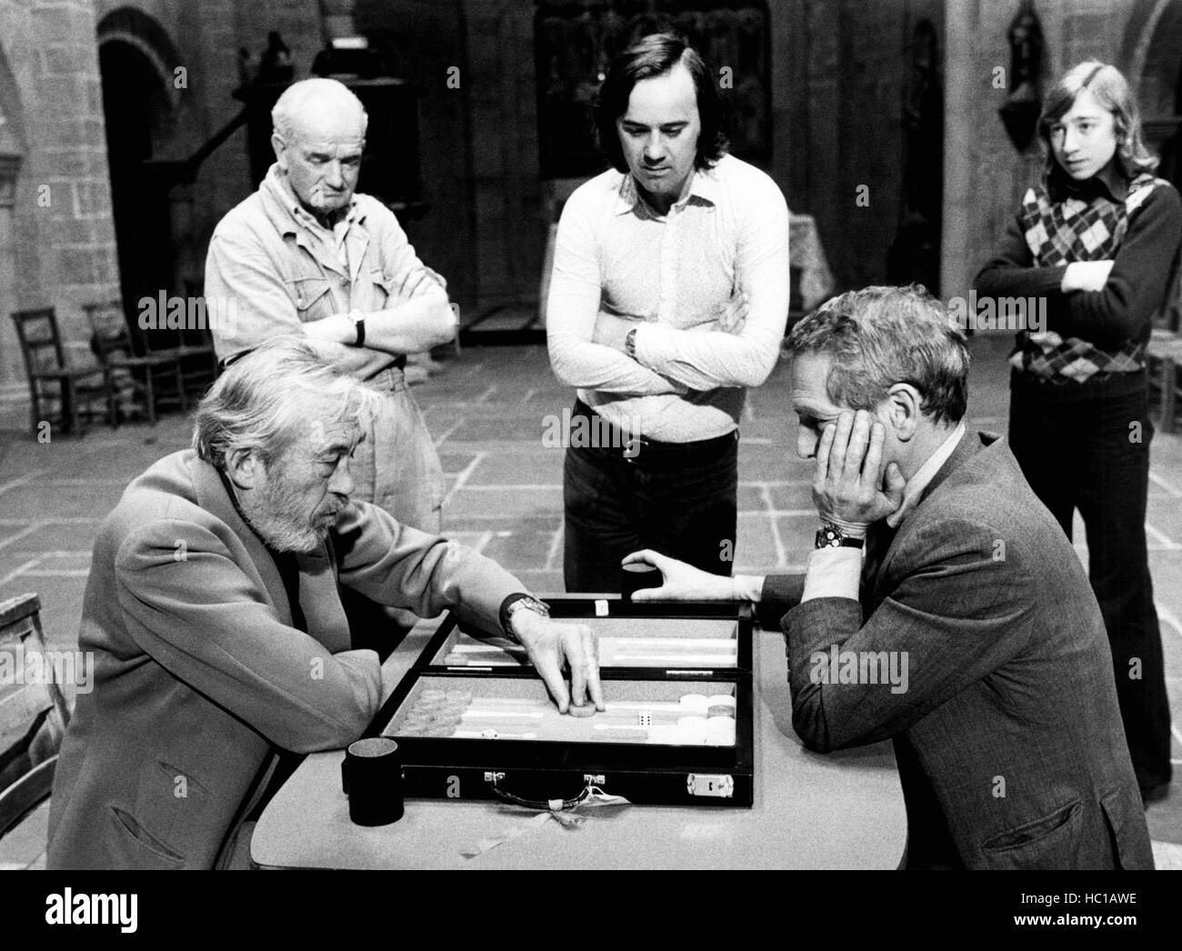 THE MACKINTOSH MAN, actor/director John Huston (lower left), Paul