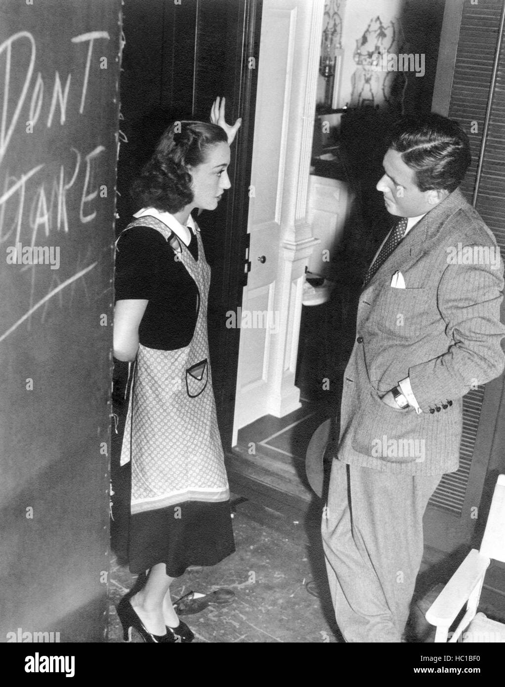 MANNEQUIN, from left Joan Crawford, Spencer Tracy, on set, 1937 Stock