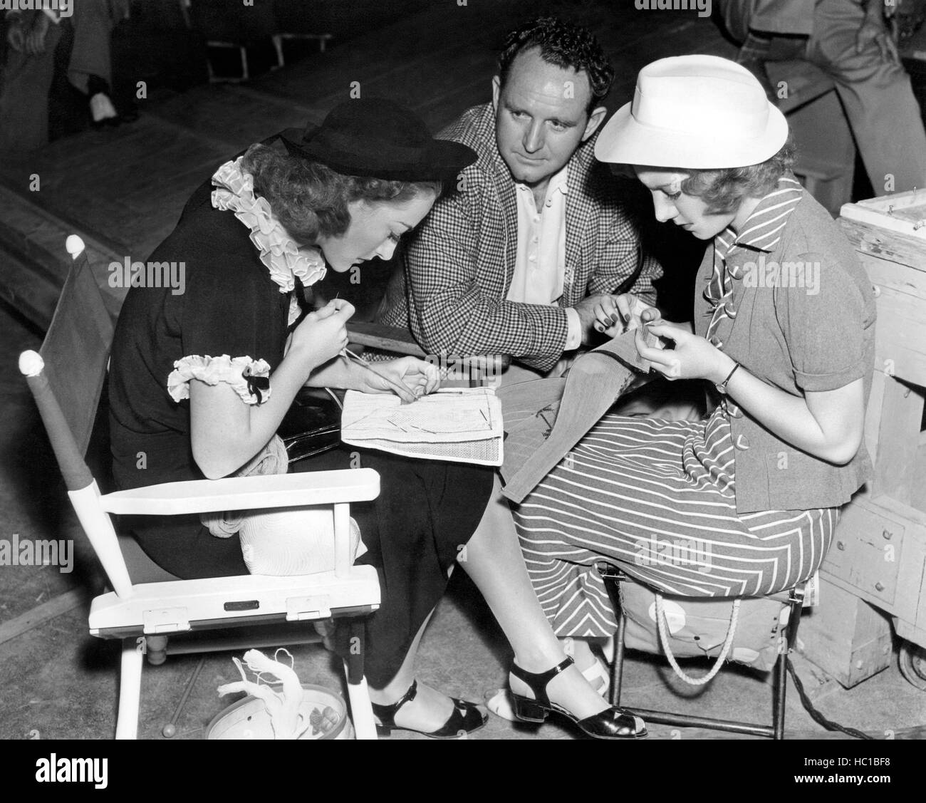 MANNEQUIN, Joan Crawford (left), director Frank Borzage (center), on