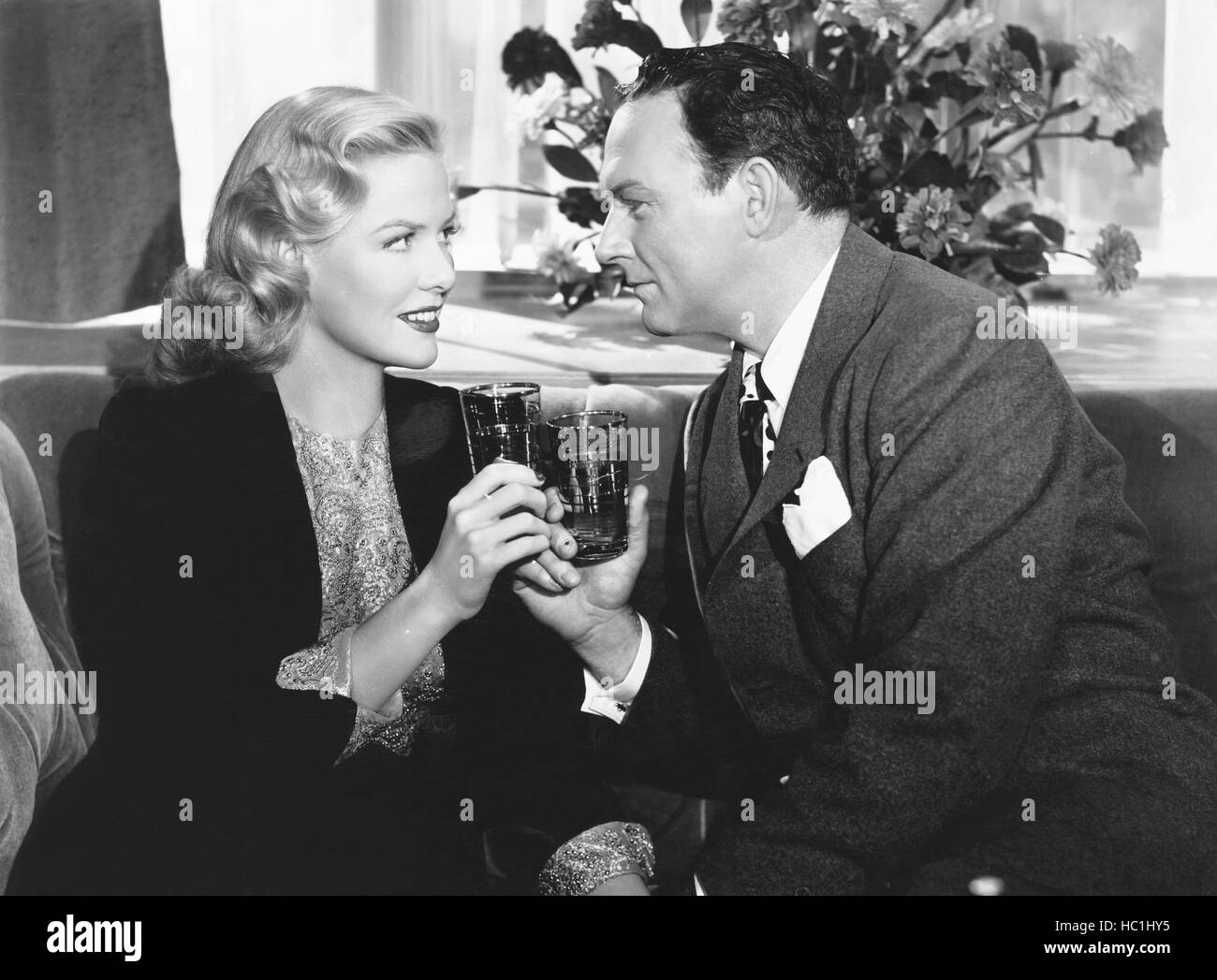NIGHT EDITOR, from left: Janis Carter, William Gargan, 1946 Stock Photo ...