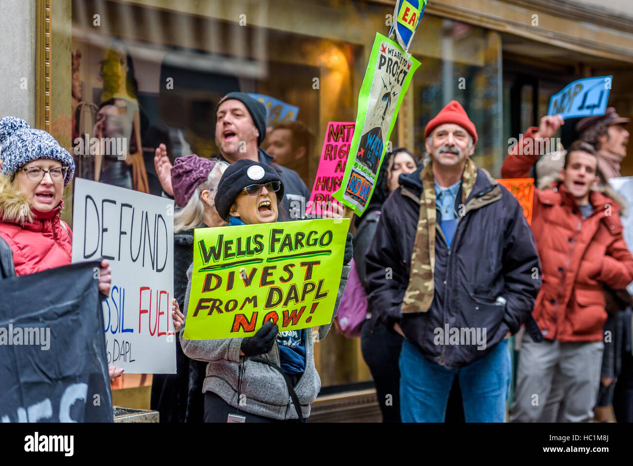 New York, United States. 06th Dec, 2016. In Solidarity with Standing Rock Sioux Tribe, #NoDAPL allies unite for a peaceful rally outside the Waldorf Astoria NYC, at the 15th Annual Wells Fargo Pipeline Symposium, to hold Wells Fargo Accountable for funding DAPL and to raise awareness of pipelines being built in New York. Credit:  Erik McGregor/Pacific Press/Alamy Live News Stock Photo