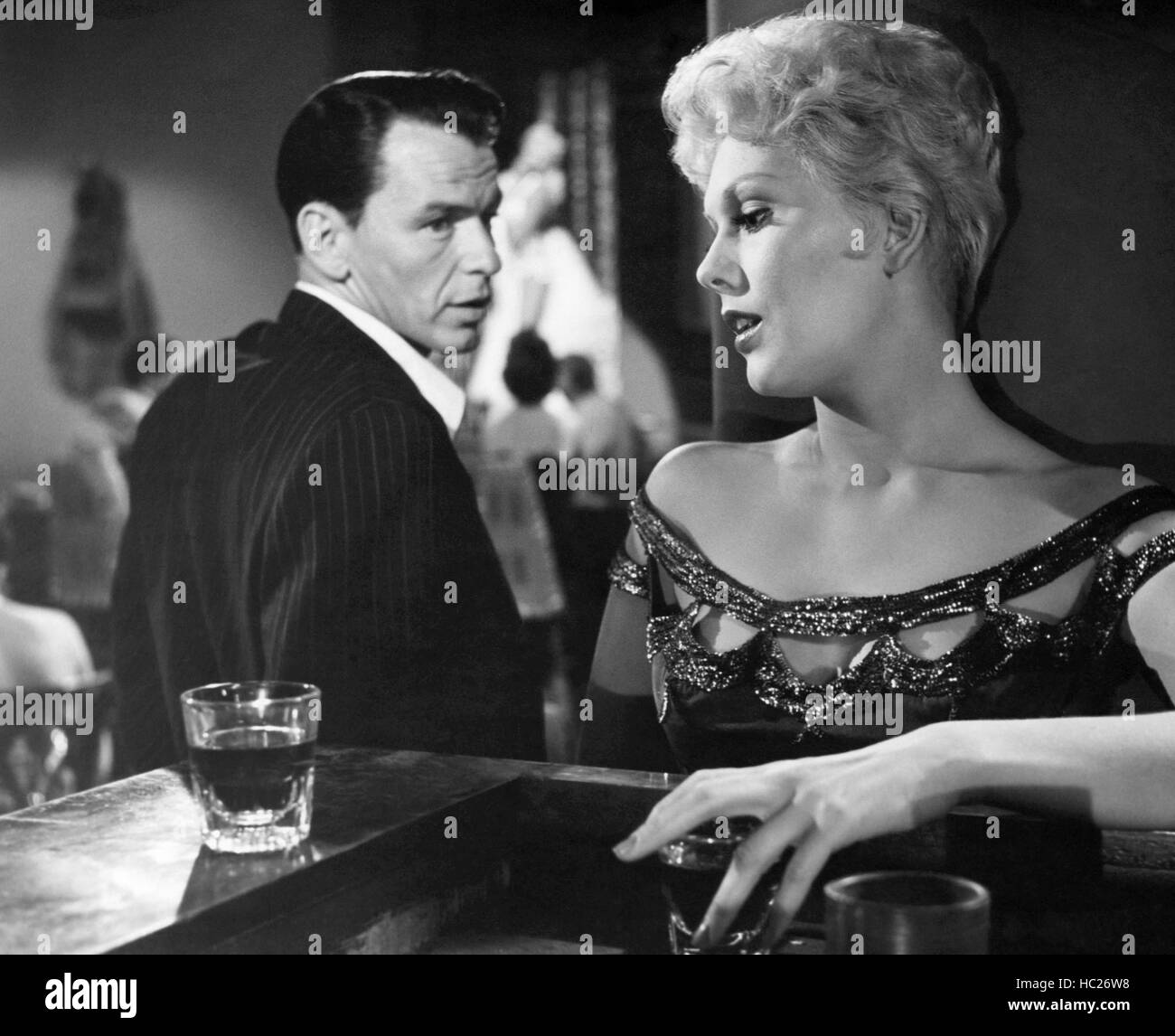 THE MAN WITH THE GOLDEN ARM, Frank Sinatra, Kim Novak, 1955 Stock Photo ...