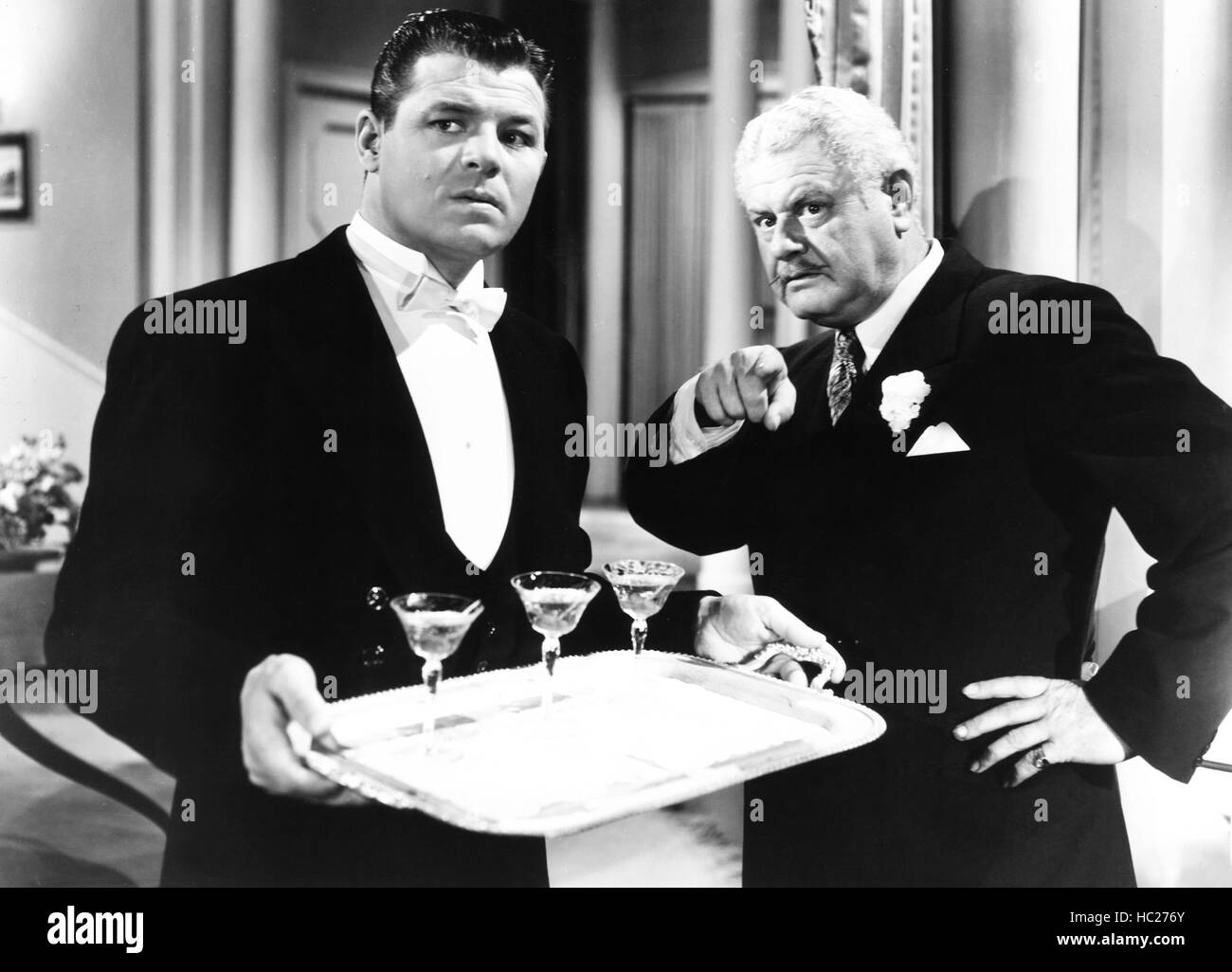 MAKE YOUR OWN BED, from left Jack Carson, Alan Hale, 1944 Stock Photo