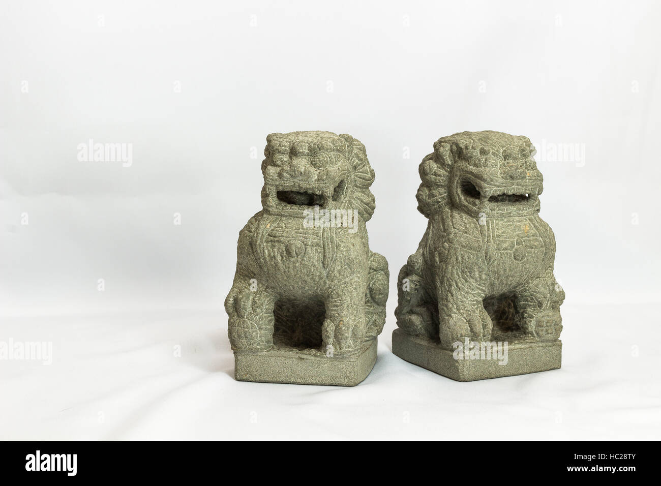 Stone Pixiu is a Chinese mythical hybrid creature considered to be a very powerful protector to practitioners of Feng Shui. It resembles a winged lion Stock Photo