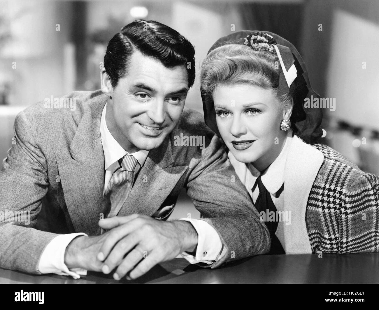 ONCE UPON A HONEYMOON, from left Cary Grant, Ginger Rogers, 1942 Stock