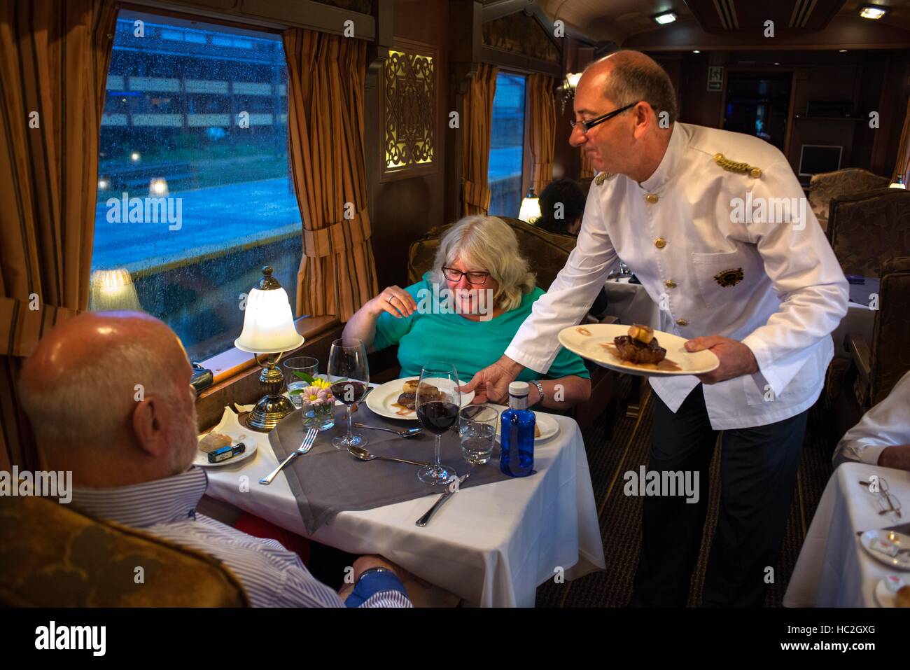 Inside of Transcantabrico Gran Lujo luxury train travellong across northern Spain, Europe. Interior of restaurant car. Stock Photo