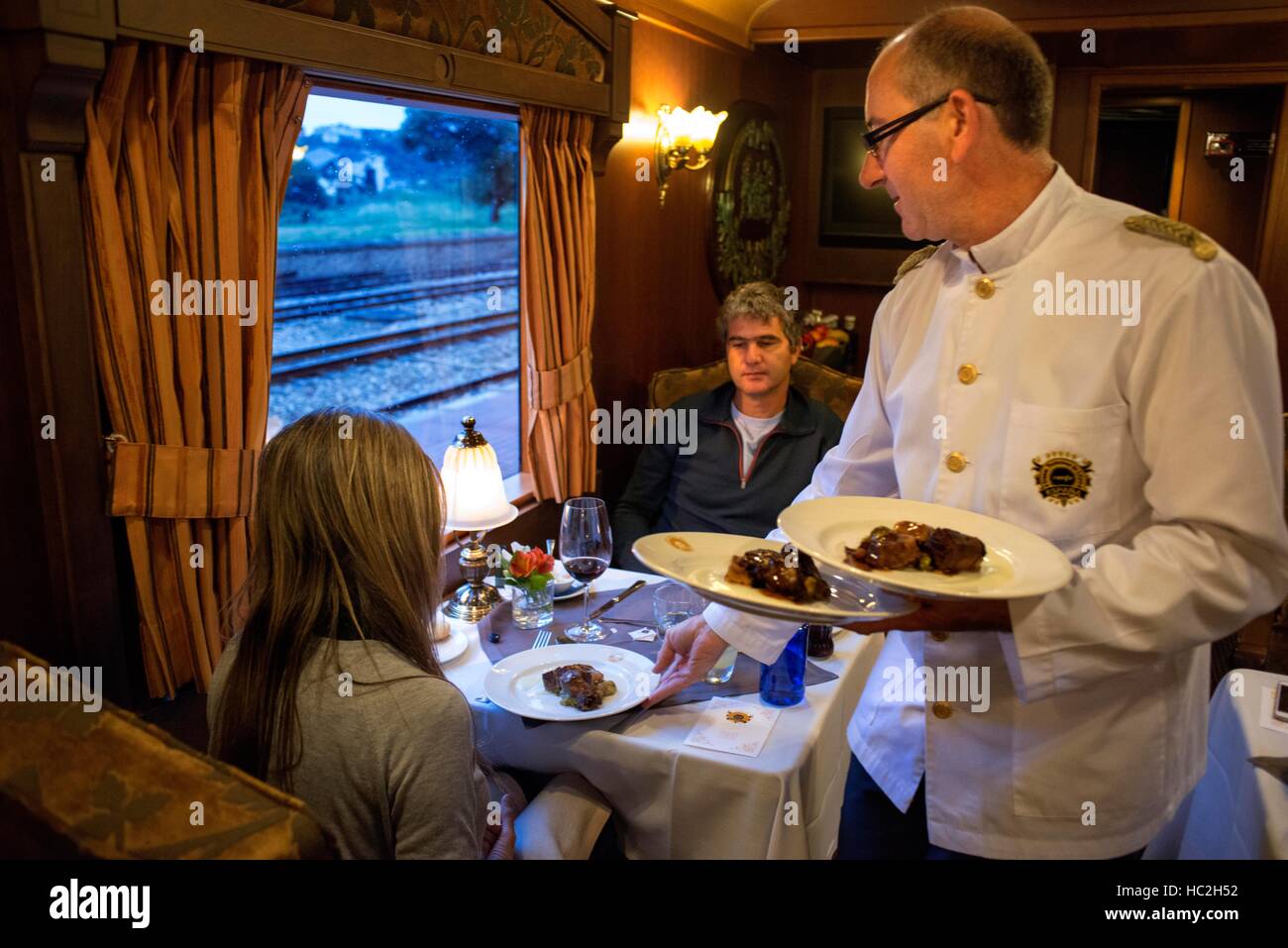Inside of Transcantabrico Gran Lujo luxury train travellong across northern Spain, Europe. Interior of restaurant car. Stock Photo