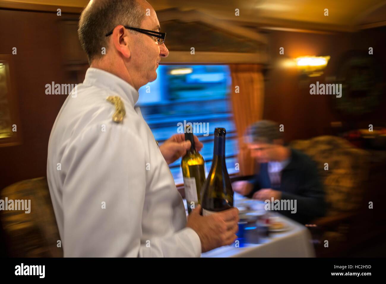 Inside of Transcantabrico Gran Lujo luxury train travellong across northern Spain, Europe. Interior of restaurant car. Stock Photo