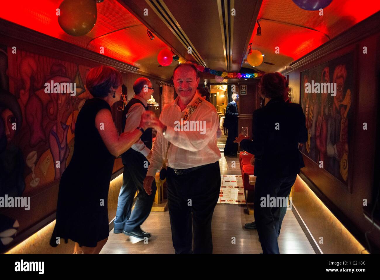 Inside of Transcantabrico Gran Lujo luxury train travellong across northern Spain, Europe. Interior of discotheque car. Party celebration. Stock Photo