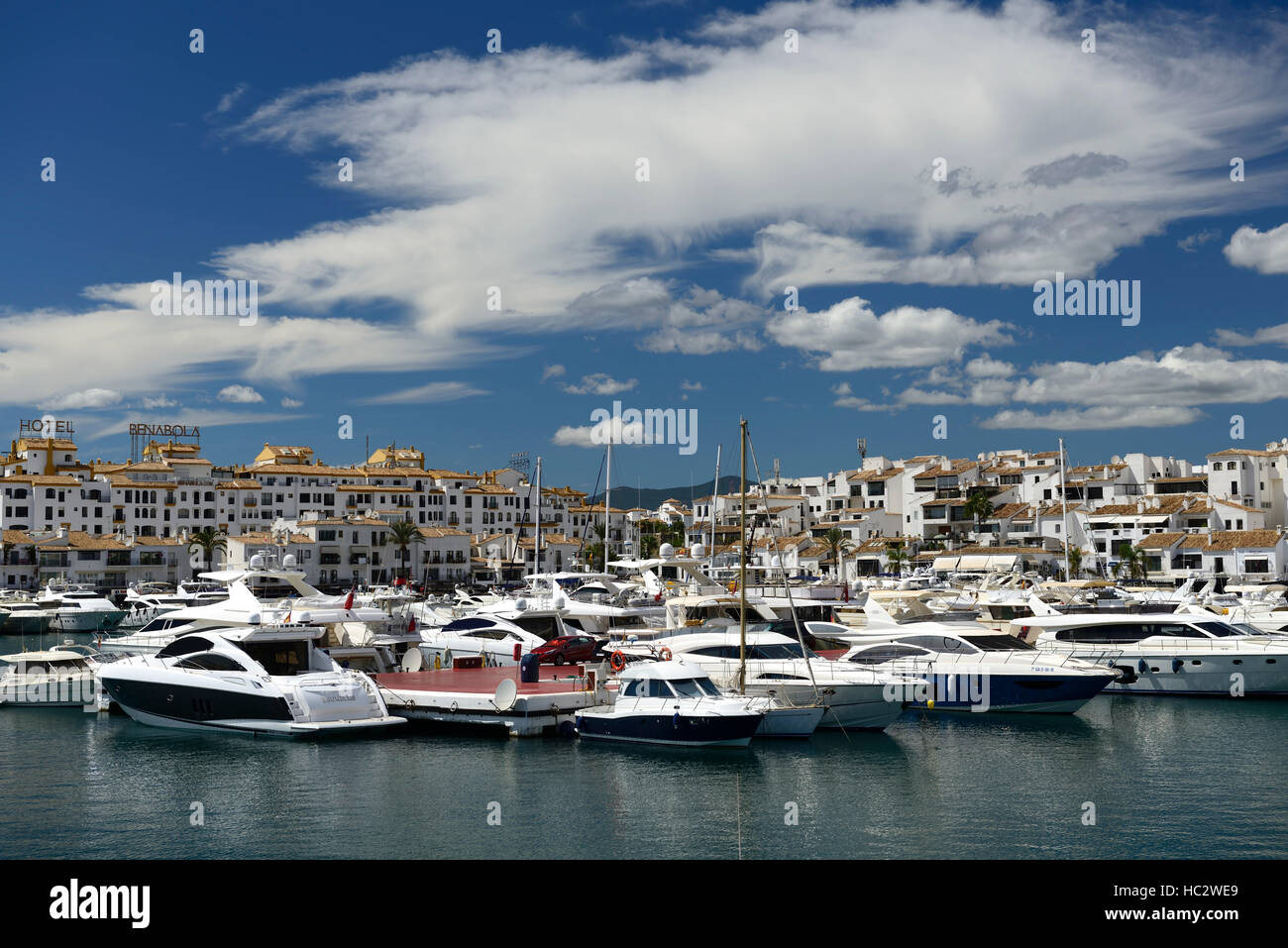Luxury yachts Marina Puerto Banus Costa del Sol Andalucia Spain wealth wealthy yachting sun boat boating harbor harbour RM World Stock Photo