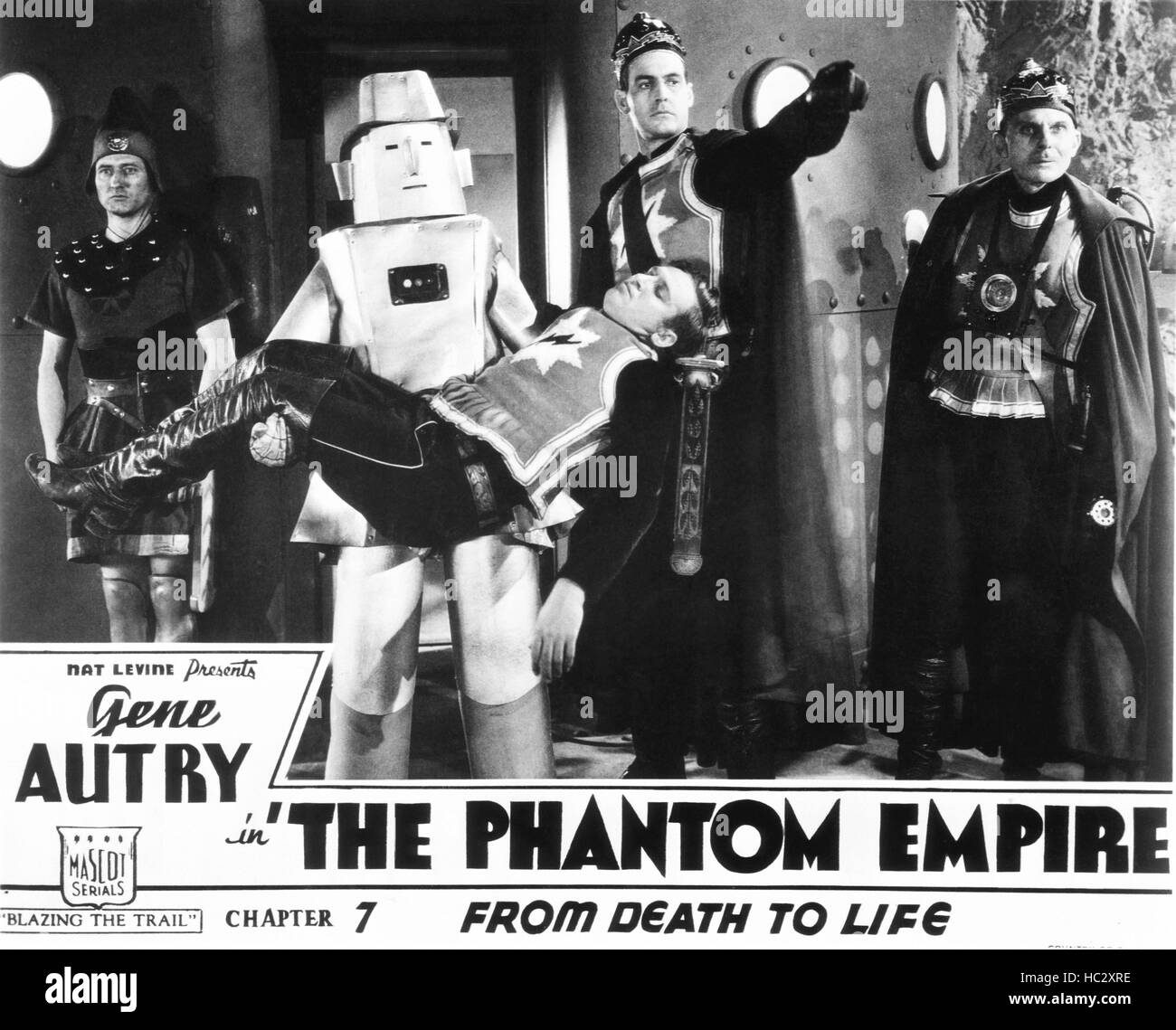 THE PHANTOM EMPIRE, US lobbycard, from left: Gene Autry (being carried ...