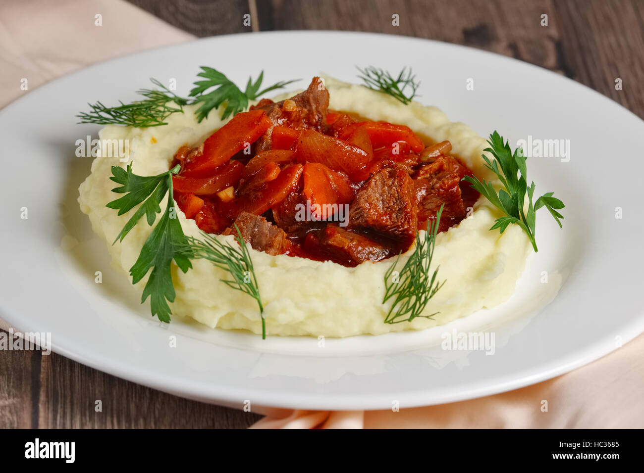 goulash with mashed potato Stock Photo