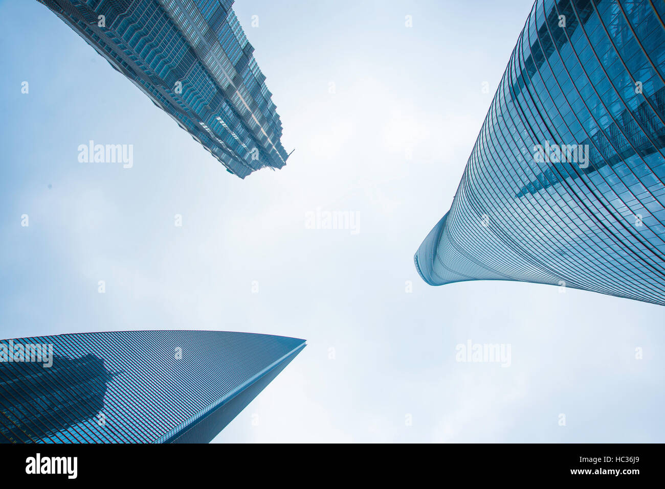 The three towers of Shanghai tallest skyscraper in Pudong commercial center hub. Stock Photo