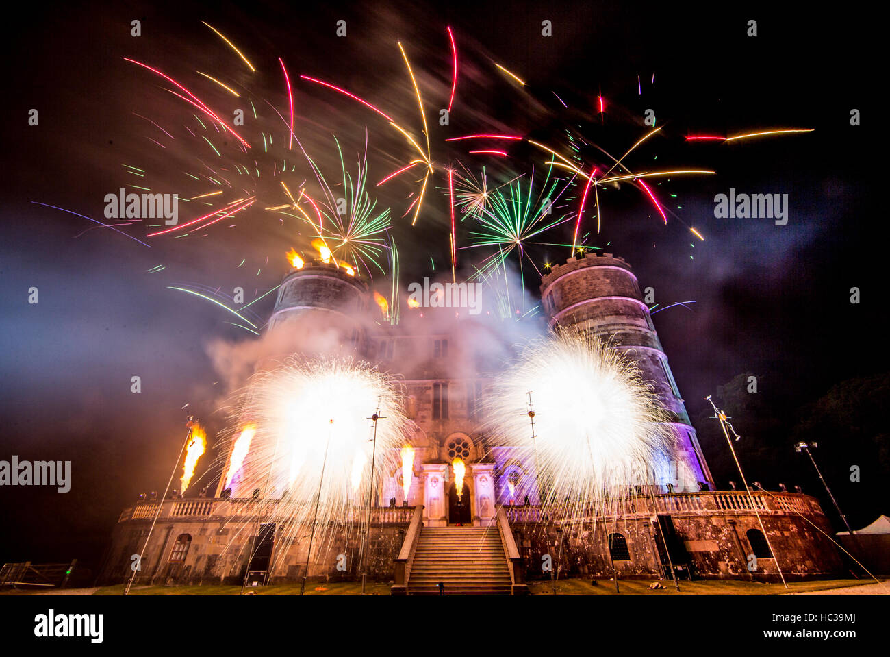 Pyrotechnics light up Lulworth Castle as Tears for Fears close the 2016 Camp Bestival festival in the grounds of the Lulworth Estate, Dorset.  Featuring: Atmosphere Where: Dorset, United Kingdom When: 31 Jul 2016 Stock Photo
