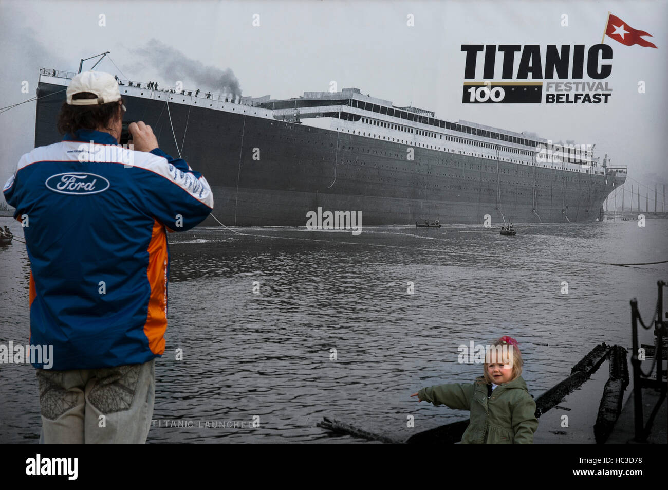 Former thompsons dry graving dock where the Titanic was built in titanic quarter queens island, Belfast Northern Ireland, UK. A Titanic poster at the Stock Photo