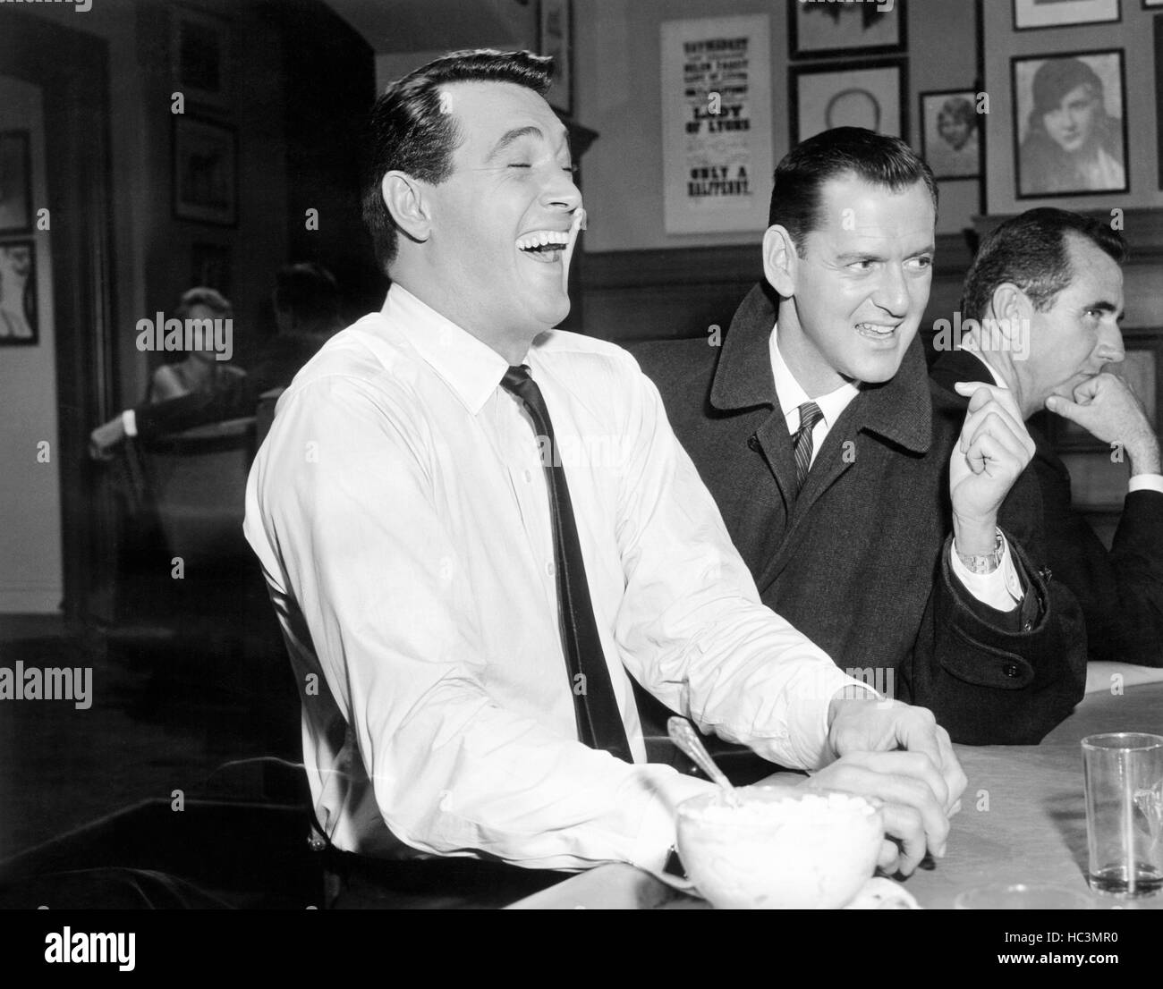 PILLOW TALK, from left: Rock Hudson, Tony Randall, having a laugh between scenes, on set, 1959 Stock Photo