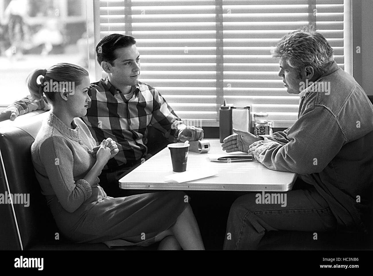 PLEASANTVILLE, Director, Gary Ross, discussing a scene with Reese