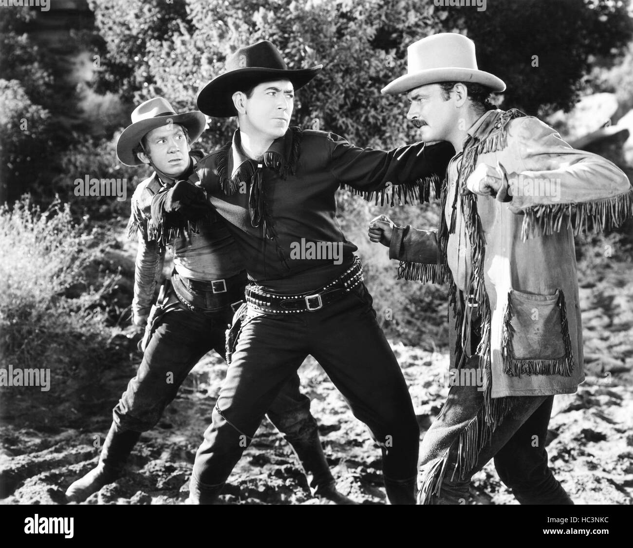 PONY POST, from left, Fuzzy Knight, Johnny Mack Brown, Ray Teal, 1940 ...