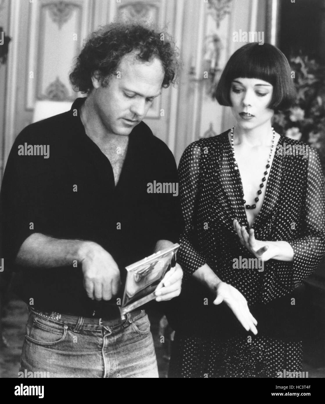 THE RAZOR'S EDGE, from left, director John Byrum, Theresa Russell, on ...