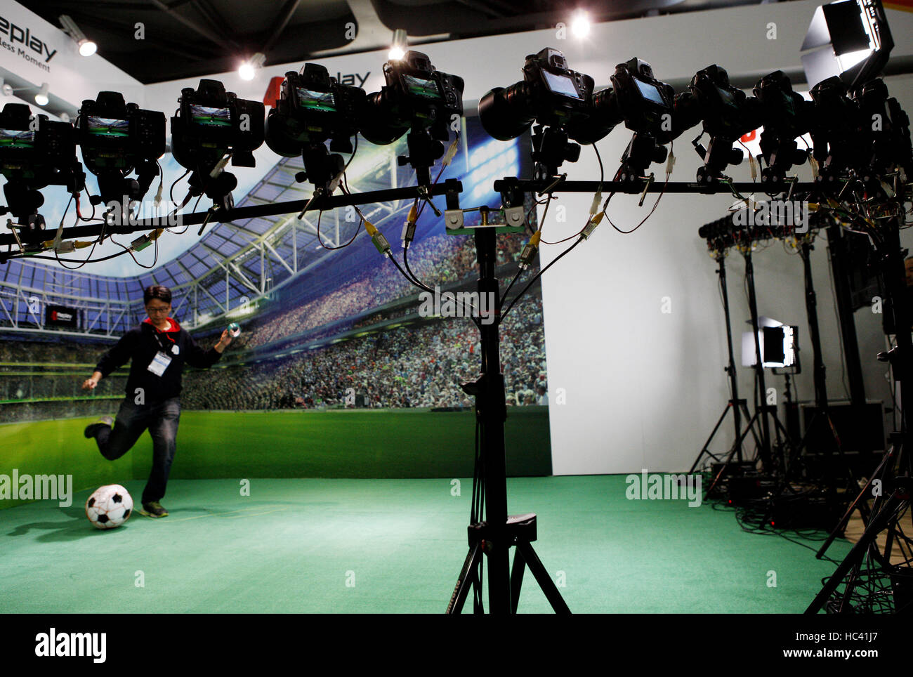 Shanghai. 7th Dec, 2016. An exhibitor shows a 4D video shooting system at the National Association of Broadcasters (NAB) Show Shanghai held in east China's Shanghai, Dec. 7, 2016. Building on the strength and success of the NAB Show brand and its global influence, Shanghai's show is the premier event for the broadcast and transmedia industry in the Asia and Pacific region. Credit:  Fang Zhe/Xinhua/Alamy Live News Stock Photo