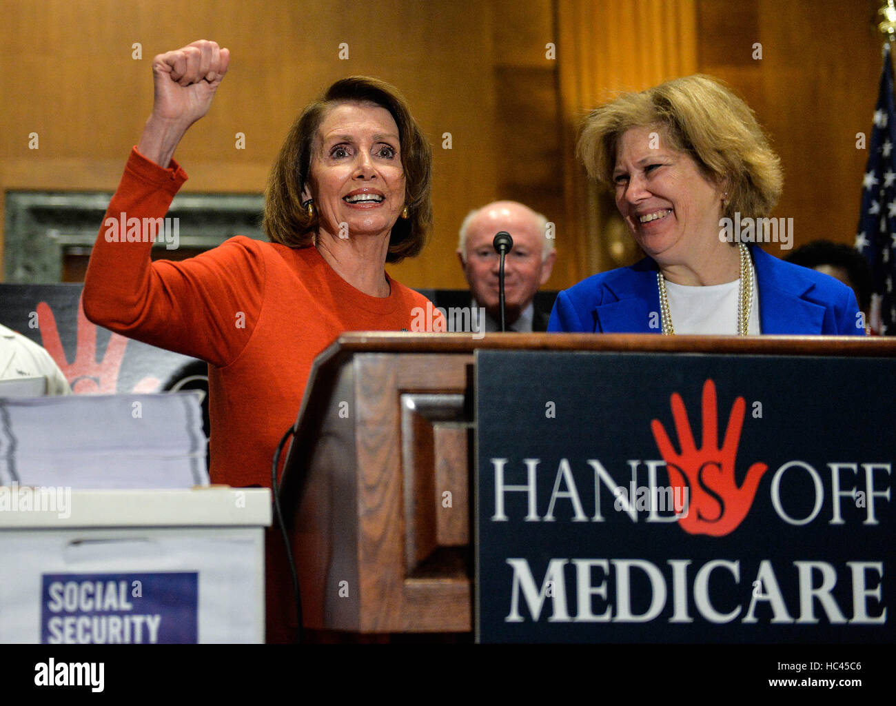 Washington, DC, USA. 7th Dec, 2016. U.S. House minority leader Nancy Pelosi (L) speaks about Medicare during a press conference on defending the Medicare on Capitol Hill in Washington, DC, capital of the United States, Dec. 7, 2016. Credit:  Bao Dandan/Xinhua/Alamy Live News Stock Photo