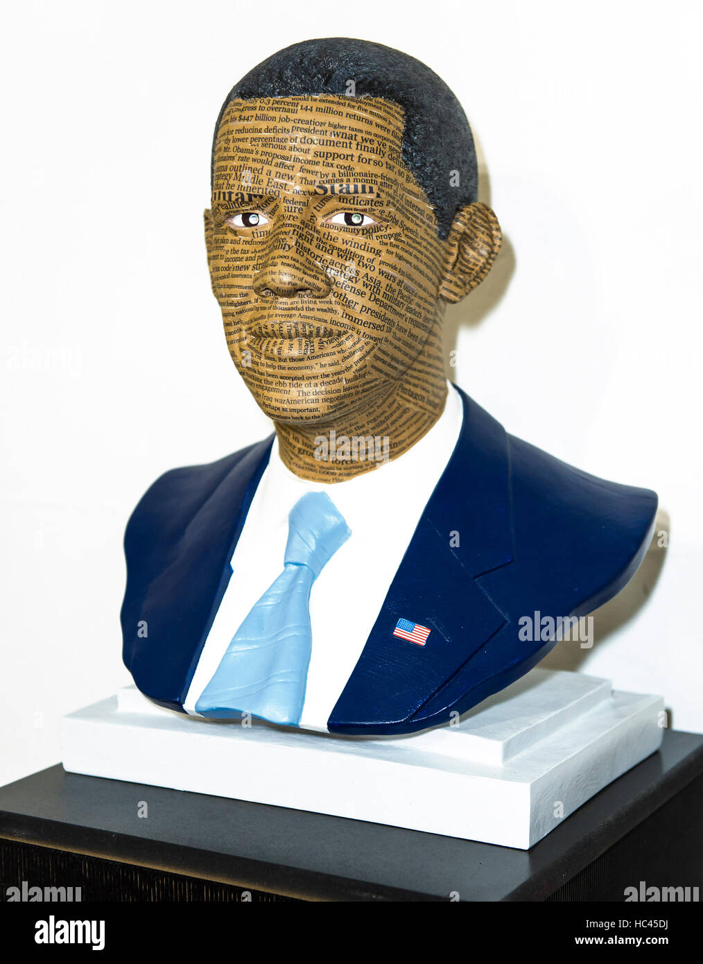 Miami, Florida, USA. 07th Dec, 2016. ''The News'' by Allie McGhee is displayed at Visions of Our 44th President, a collective sculptural show created to recognize and celebrate the historical significance of the first African American President of the United States, Barack Obama. The show, featuring the work of 44 African American artists, will run at the Historic Lyric Theater until February 28, 2017. Credit:  Brian Cahn/ZUMA Wire/Alamy Live News Stock Photo