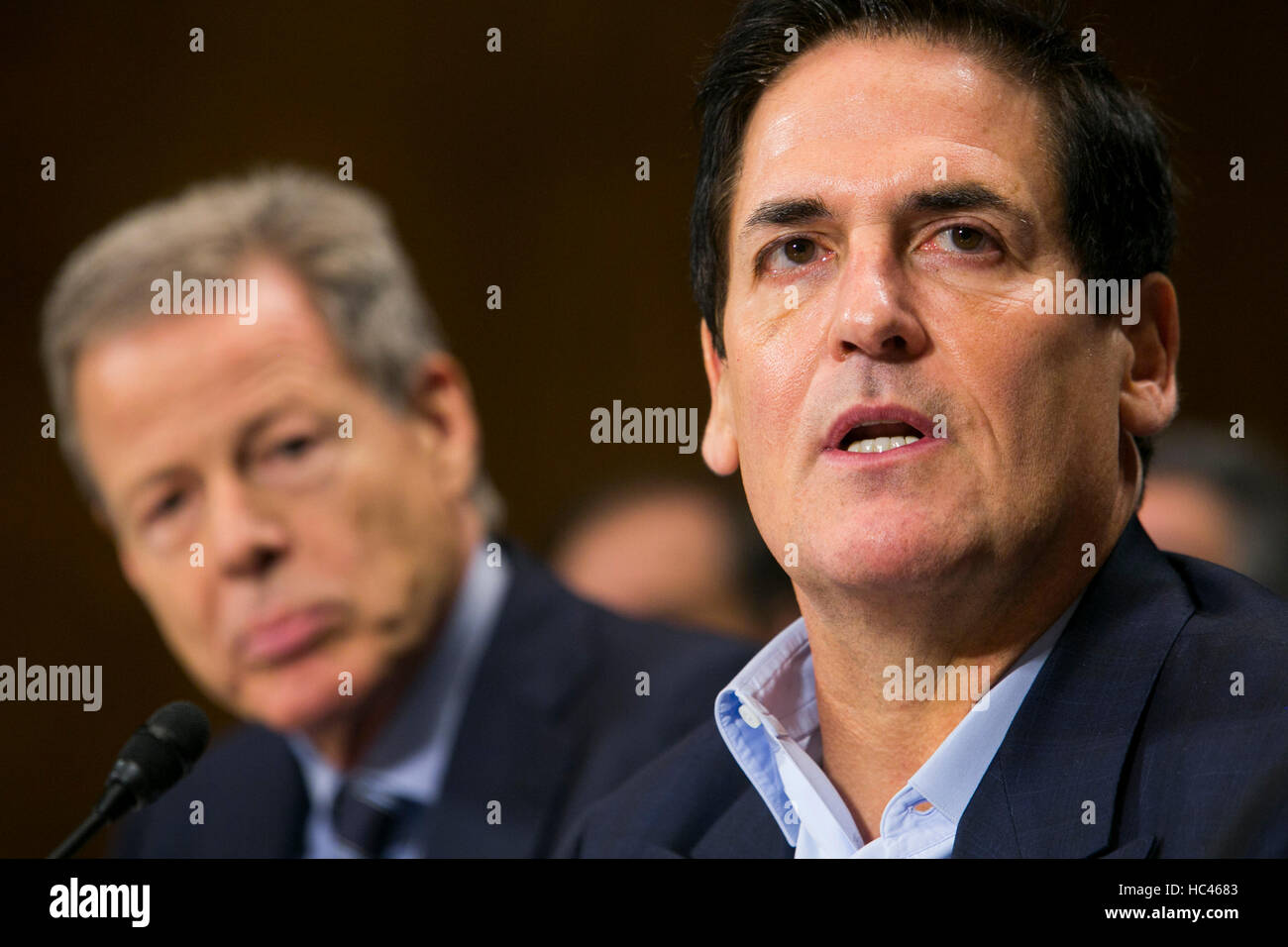 Washington DC, USA. 7th December, 2016. Jeffrey Bewkes, Chairman & CEO, Time Warner, left, and Mark Cuban, Chairman, AXS TV, right, testify before the United States Senate Committee on the Judiciary Subcommittee on Antitrust, Competition Policy & Consumer Rights during a hearing on the pending AT&T and Time Warner merger in Washington, D.C. on December 7, 2016. Credit:  Kristoffer Tripplaar/Alamy Live News Stock Photo