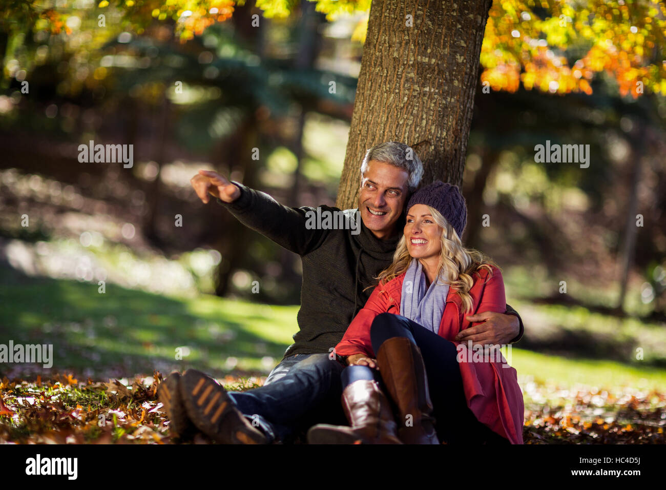 Couple Sitting Under Tree High Resolution Stock Photography and Images ...