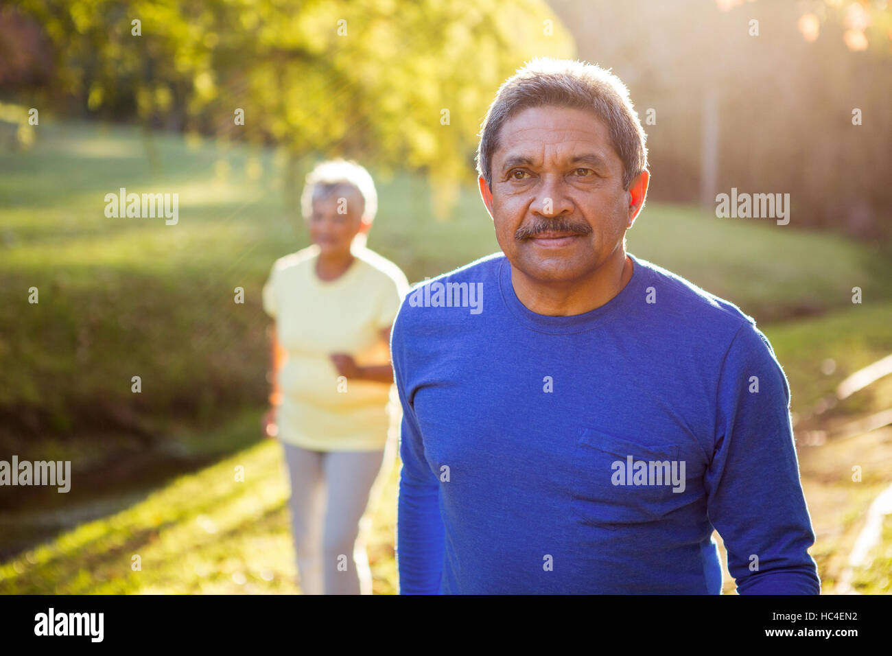 Elderly man walking in countryside hi-res stock photography and images ...