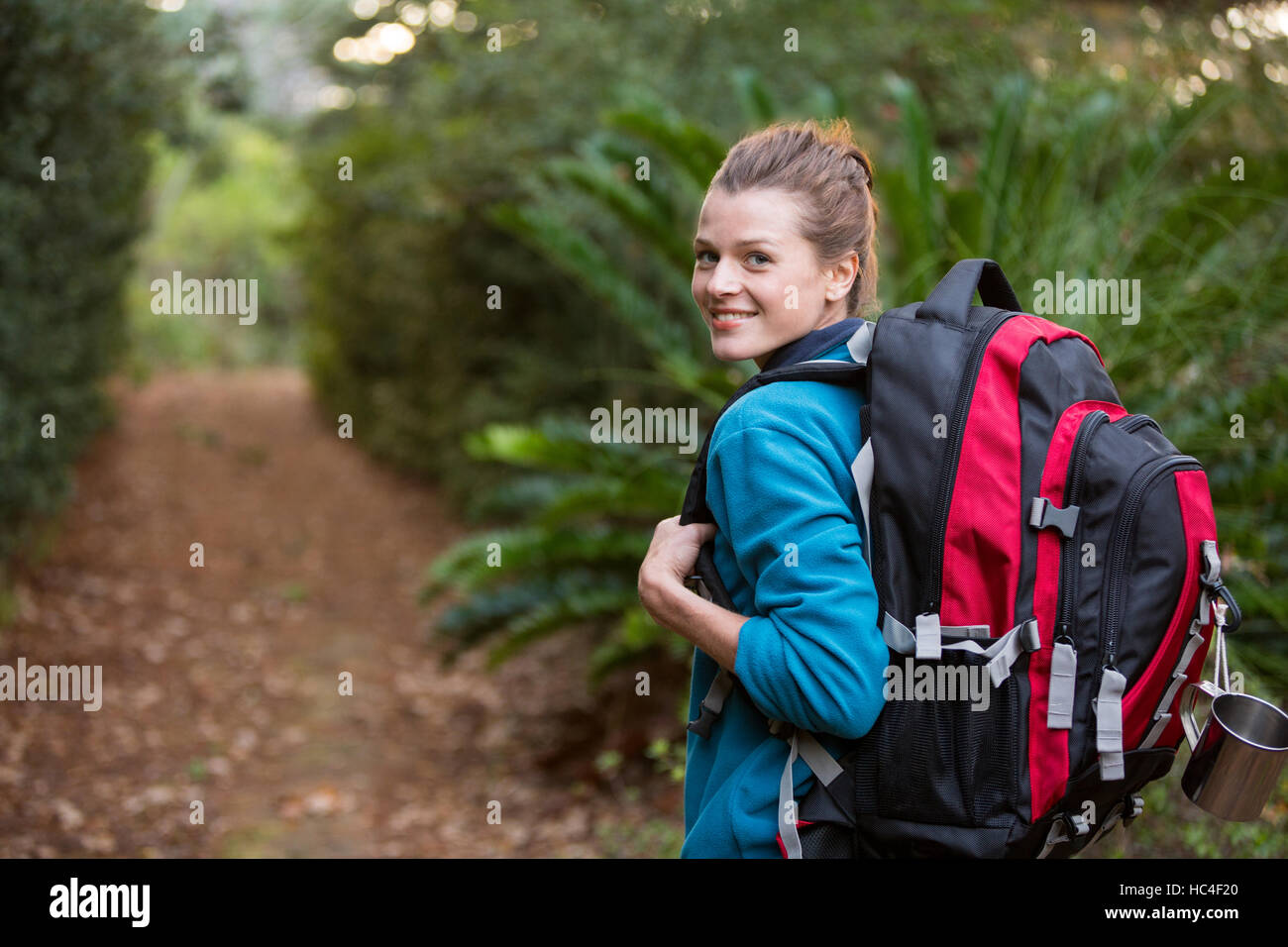 Hiker standing by tree hi-res stock photography and images - Alamy
