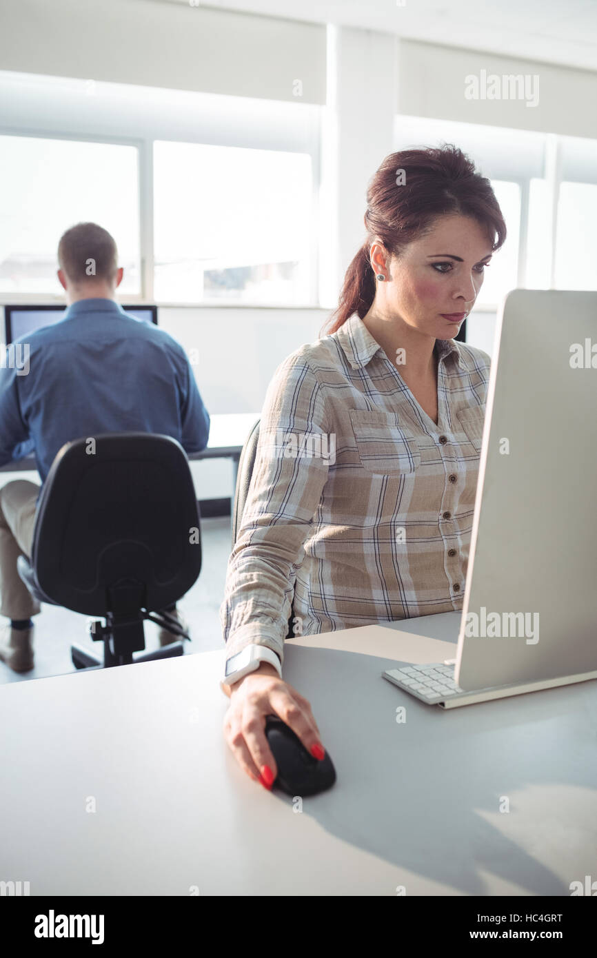 Mature students using computer Stock Photo - Alamy